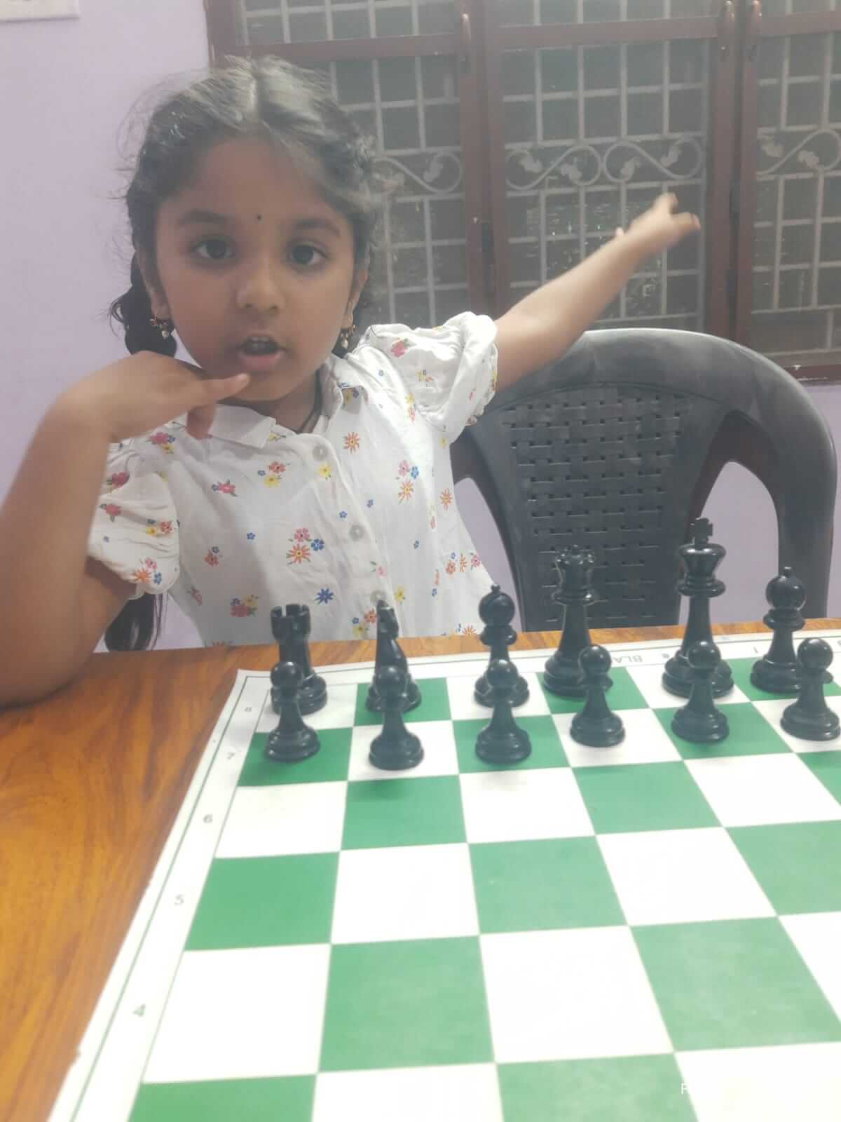 Young students learning chess basics
